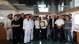 From Left to Right: 2/Cook Xin Bing, G/E Sun Xiangjian, 3/O Liu Jianqi, C/O Marc Pappin, AB Tong Yi'nan, 3/O Li Sanqing, C/Cook trainee Zeng Mingsheng, DFM Zhao Hongxing, 3/E Wu Xuebin, 3/O Cheng Yu, Fitter Li Zhongyi, OS Guan Fusheng, C/Steward Cao Qun, Oiler Li Hongwei, Steward Yu Xiaodan, 2/E Bai Xirui, GM Paul Oliver, Capt. Malcolm Lakey, AB Xu Tao, C/E Chris Hart, OS Wang Jun, 3/E Luan Yunxiu, 2/E Kong Lingwen, Bosun Xu Hongwei.